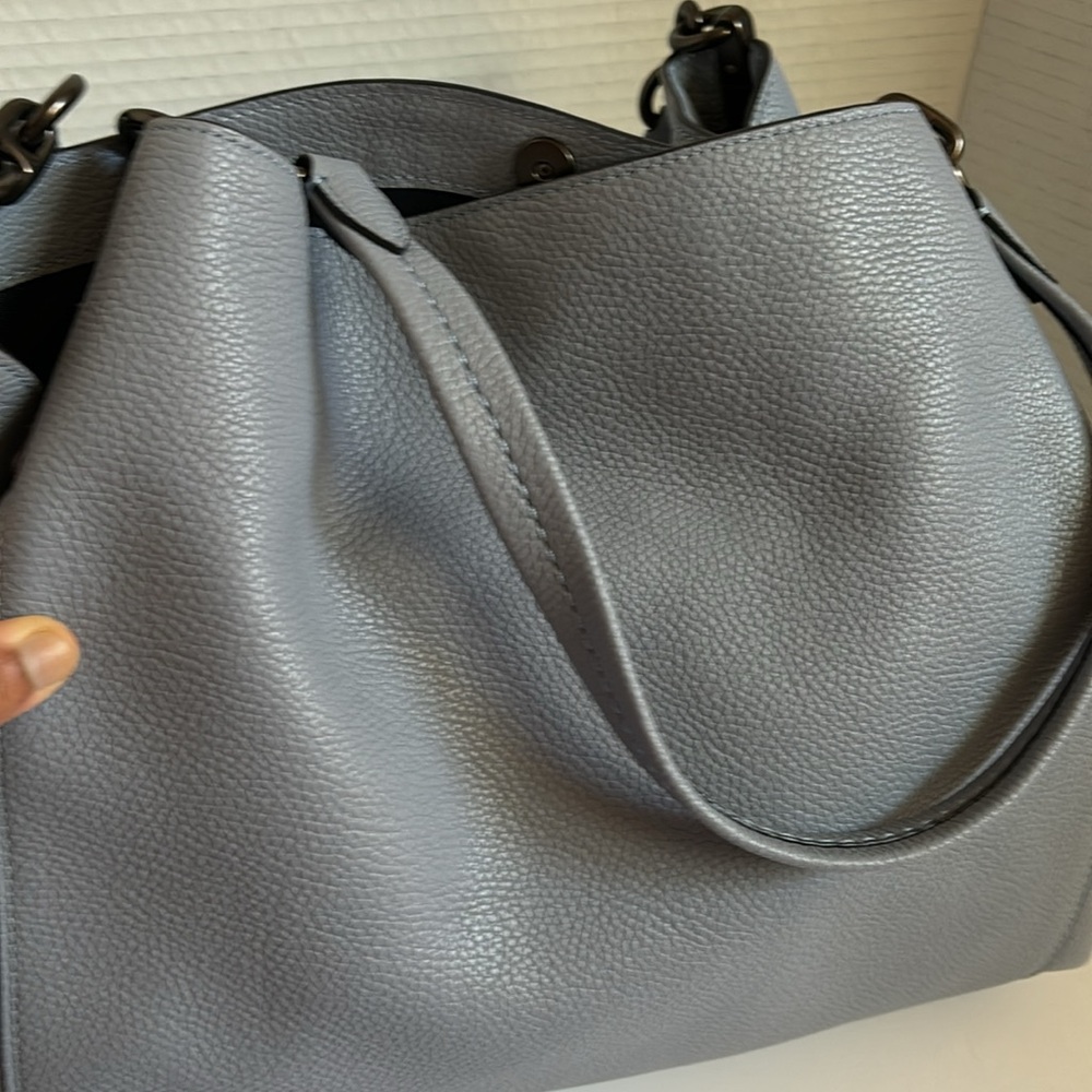 Light blue color Coach hand bag